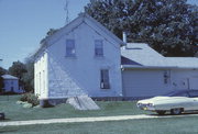 N SIDE OF CREEK RD, OPP 1/4 MIL N OF TRACKS, N TIFFANY, a Greek Revival house, built in La Prairie, Wisconsin in 1846.