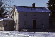 205 E MADISON AVE, a Greek Revival house, built in Milton, Wisconsin in 1853.