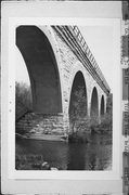 NORTHWESTERN RAILROAD TRACKS OVER TURTLE CREEK, a NA (unknown or not a building) stone arch bridge, built in Turtle, Wisconsin in 1869.