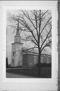 ON BUSS ROAD, ONE BLOCK S OF SHOPIERE RD, a Greek Revival house of worship, built in Turtle, Wisconsin in 1850.