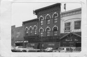 113-115 W MAIN ST, a Italianate retail building, built in Madison, Wisconsin in 1873.