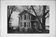 A, EAST OF THE PRESBYTERIAN CHURCH, a Queen Anne rectory/parsonage, built in Johnstown, Wisconsin in 1889.