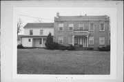 EAST SIDE OF WILDER RD, a Federal house, built in Porter, Wisconsin in 1850.