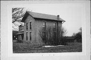 SOUTHEAST CORNER OF FOX RD, AND COUNTY HIGHWAY M, a Gabled Ell house, built in Porter, Wisconsin in 1860.