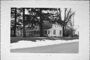 SE SIDE OF 184, MAIN ST, 1/2 BLOCK W OF R., a Greek Revival house, built in Fulton, Wisconsin in 1850.