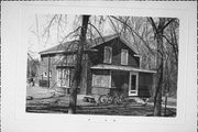 NORTHWEST CORNER OF HARRISON AND UNKNOWN ST, a Greek Revival house, built in Fulton, Wisconsin in 1860.