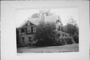 1303 BUSHNELL ST, a Queen Anne house, built in Beloit, Wisconsin in 1904.