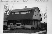 1740 HEMLOCK ST, a Dutch Colonial Revival house, built in Beloit, Wisconsin in 1917.