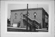 102 ALLEN, a Italianate large retail building, built in Clinton, Wisconsin in 1870.