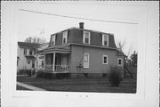 1ST HOUSE S OF SW CORNER OF SWIFT & PARK, a Second Empire house, built in Edgerton, Wisconsin in 1870.