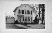 20 S 1ST ST, a Italianate religious residence, built in Evansville, Wisconsin in 1884.