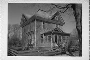 123 S 1ST ST, a American Foursquare house, built in Evansville, Wisconsin in 1902.