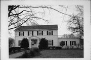 227 W GARFIELD AVE, a Colonial Revival/Georgian Revival house, built in Evansville, Wisconsin in 1940.