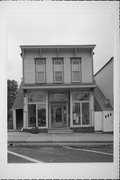 24 E MAIN ST, a Commercial Vernacular retail building, built in Evansville, Wisconsin in 1885.