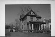132 W MAIN ST, a Queen Anne house, built in Evansville, Wisconsin in 1900.