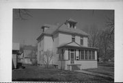 204 W MAIN ST, a Queen Anne house, built in Evansville, Wisconsin in 1893.