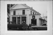 220 DEPOT ST, a Greek Revival retail building, built in Footville, Wisconsin in 1860.