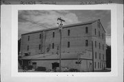 207 N ACADEMY ST, a Astylistic Utilitarian Building warehouse, built in Janesville, Wisconsin in 1901.