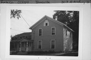 307 N ACADEMY ST, a Gabled Ell house, built in Janesville, Wisconsin in 1857.