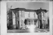 102-104 N ATWOOD AVE, a Italianate duplex/two-flat, built in Janesville, Wisconsin in 1876.
