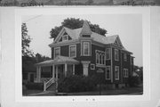 217 CORNELIA ST, a Queen Anne house, built in Janesville, Wisconsin in 1893.