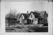 303 CORNELIA ST, a Early Gothic Revival house, built in Janesville, Wisconsin in 1870.