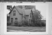 303 CORNELIA ST, a Early Gothic Revival house, built in Janesville, Wisconsin in 1870.