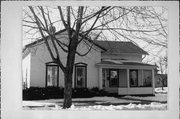 445 CORNELIA ST, a Gabled Ell house, built in Janesville, Wisconsin in 1860.