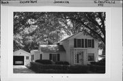 233 S GARFIELD AVE, a Greek Revival house, built in Janesville, Wisconsin in 1865.