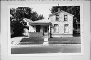 323 N HIGH ST, a Gabled Ell house, built in Janesville, Wisconsin in 1861.