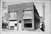 212 N JACKSON ST, a Commercial Vernacular retail building, built in Janesville, Wisconsin in 1921.