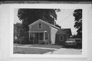 310 N JACKSON ST, a Greek Revival house, built in Janesville, Wisconsin in 1855.