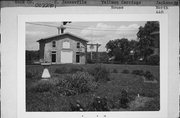 440 N JACKSON ST, a Italianate carriage house, built in Janesville, Wisconsin in 1857.