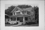 114 JEFFERSON AVE, a Queen Anne house, built in Janesville, Wisconsin in 1908.