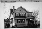 114 JEFFERSON AVE, a Queen Anne house, built in Janesville, Wisconsin in 1908.