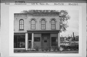 123 N MAIN ST, a Italianate small office building, built in Janesville, Wisconsin in 1851.