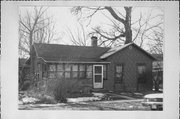451 N MAIN ST, a Gabled Ell house, built in Janesville, Wisconsin in 1860.