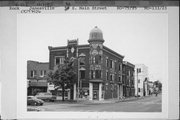 52 S MAIN ST, a Queen Anne large retail building, built in Janesville, Wisconsin in 1895.