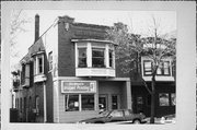 60 S MAIN ST, a Commercial Vernacular small retail building, built in Janesville, Wisconsin in 1911.