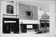 205 E MILWAUKEE ST, a Commercial Vernacular small retail building, built in Janesville, Wisconsin in 1955.