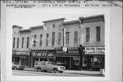 117-119 W MILWAUKEE ST, a Commercial Vernacular small retail building, built in Janesville, Wisconsin in 1869.