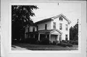 303 N WASHINGTON ST, a Greek Revival house, built in Janesville, Wisconsin in 1853.