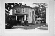 316 N WASHINGTON ST, a Queen Anne house, built in Janesville, Wisconsin in 1883.