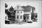 414 N WASHINGTON ST, a Queen Anne house, built in Janesville, Wisconsin in 1909.