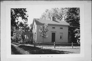 205 E MADISON AVE, a Greek Revival house, built in Milton, Wisconsin in 1853.