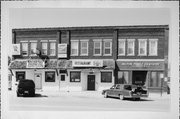 311-319 PARKVIEW DR, a Commercial Vernacular large retail building, built in Milton, Wisconsin in 1916.