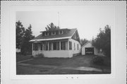 W SIDE OF GERMAN ST, a Bungalow house, built in Hawkins, Wisconsin in 1920.