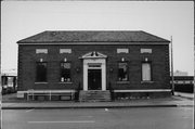 212 W MINER AVE, a Colonial Revival/Georgian Revival post office, built in Ladysmith, Wisconsin in 1935.