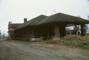RAILROAD ST, a Neoclassical/Beaux Arts depot, built in Reedsburg, Wisconsin in 1905.