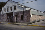 121 S WEBB AVE, a Commercial Vernacular livery/stable, built in Reedsburg, Wisconsin in 1911.